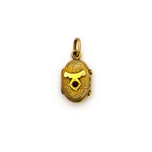 Tiny Oval Garnet Locket